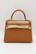 HERMÈS Kelly 25 Gold