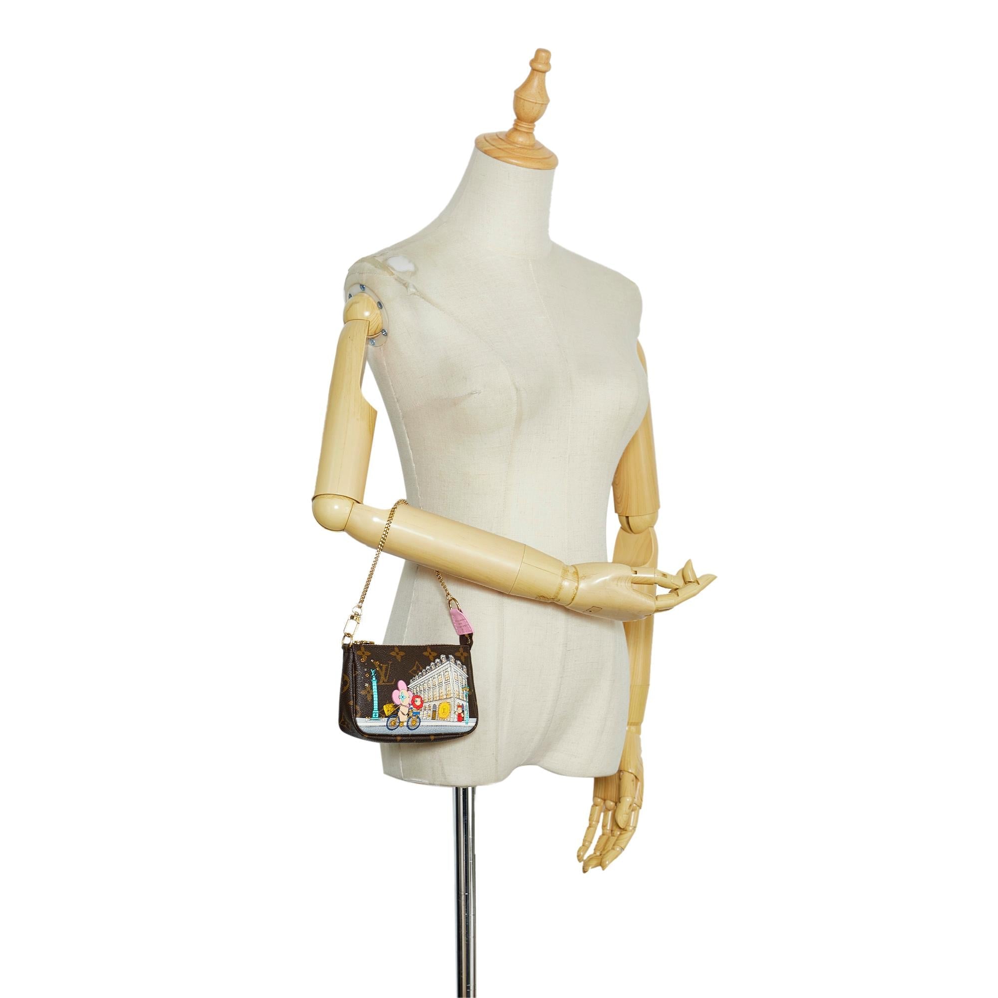 Louis Vuitton Limited Edition Vivienne Mini Monogram Pochette Accessoires (SHG-Ndr7pH)