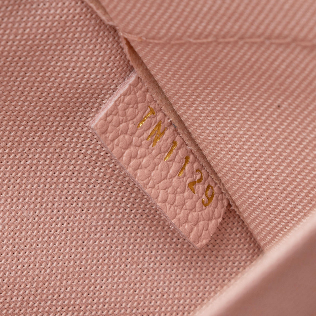 Louis Vuitton Monogram Empreinte Daily Pouch (SHF-bIZad3)