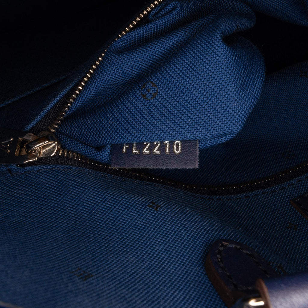 Louis Vuitton Monogram Escale OntheGo GM (SHG-zq74qa)