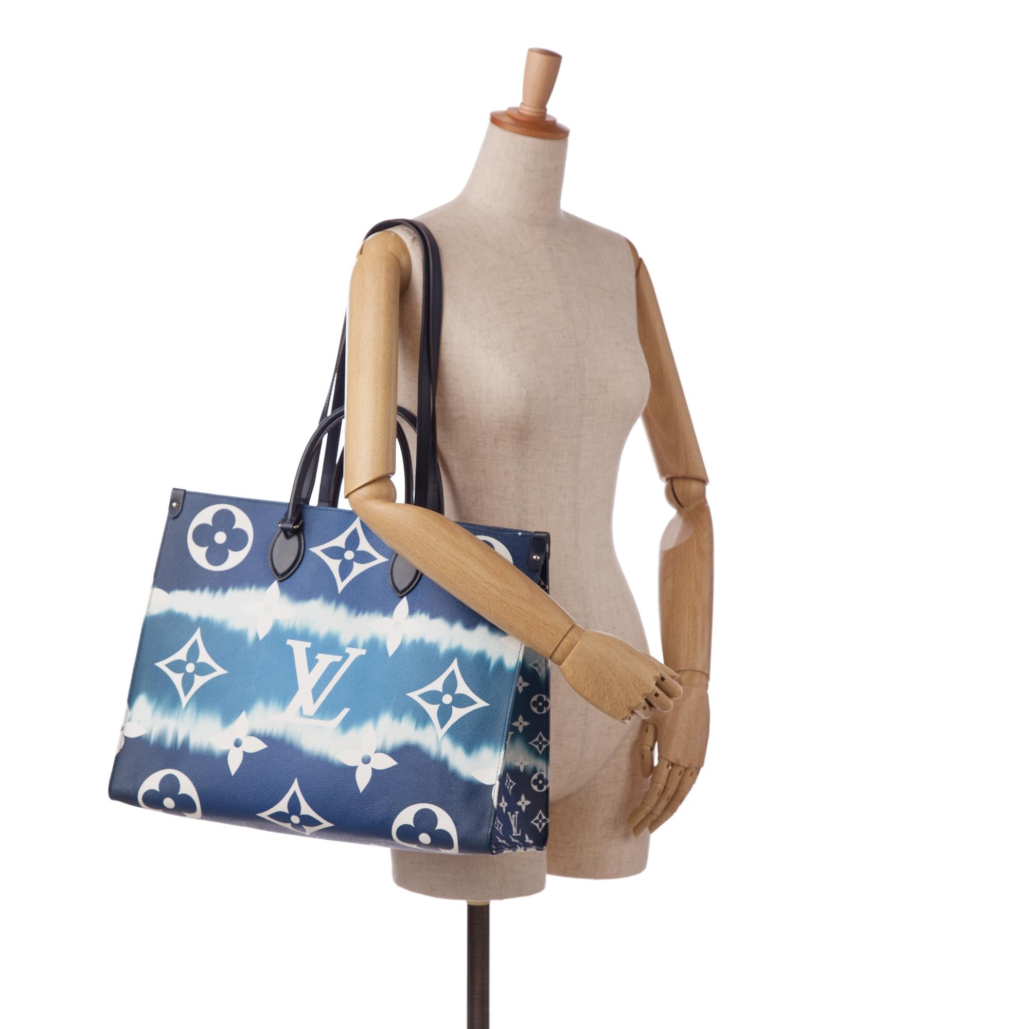Louis Vuitton Monogram Escale OntheGo GM (SHG-zq74qa)