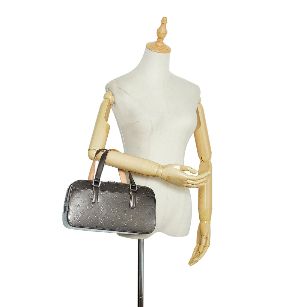 Louis Vuitton Monogram Glace Shelton (SHG-8ywIEt)