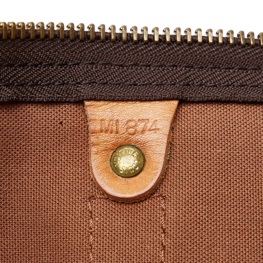 Louis Vuitton Monogram Keepall 55 (SHG-3nAVwN)