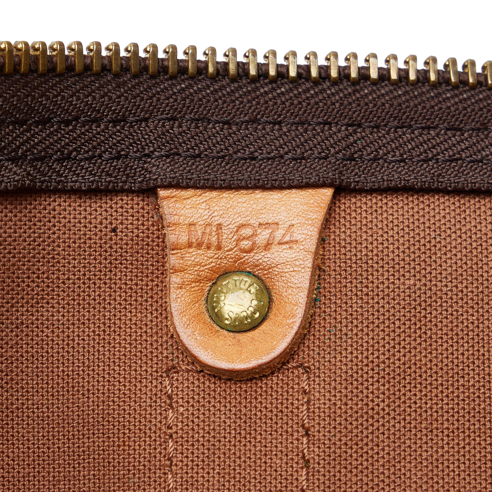 Louis Vuitton Monogram Keepall 55 (SHG-3nAVwN)