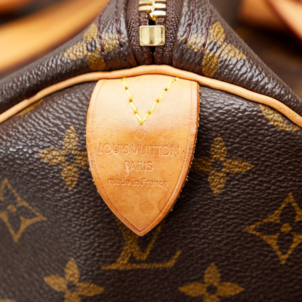 Louis Vuitton Monogram Keepall 60 (SHG-RtwaIk)