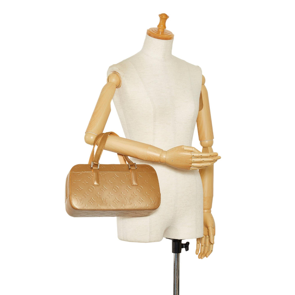 Louis Vuitton Monogram Mat Shelton (SHG-4OLIpQ)
