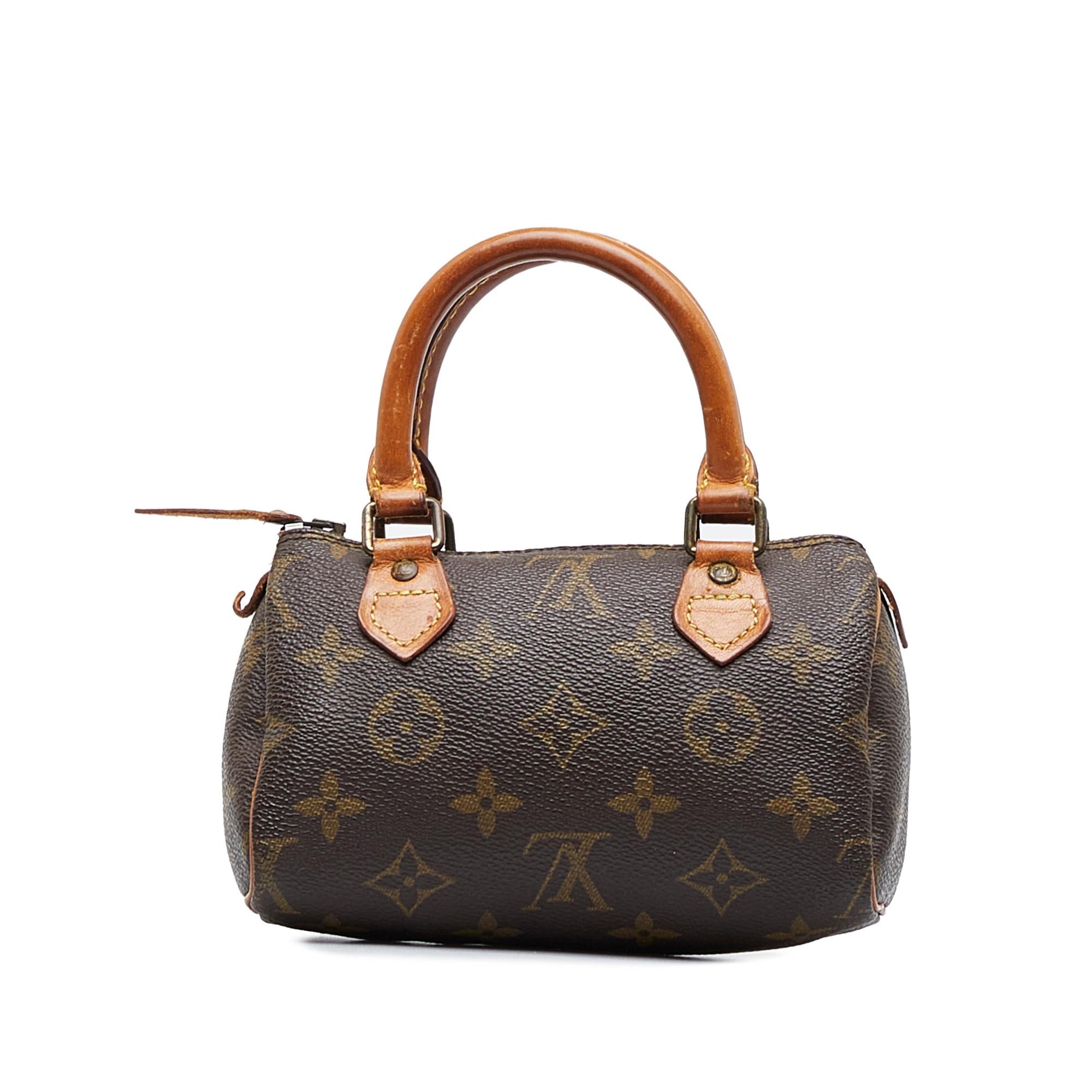 Louis Vuitton Monogram Mini HL Speedy (SHG-u9AcQi)