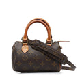 Louis Vuitton Monogram Mini HL Speedy (SHG-u9AcQi)