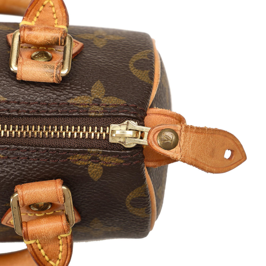 Louis Vuitton Monogram Mini HL Speedy (SHG-k9D0rg)