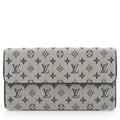 Louis Vuitton Monogram Mini Lin Porte Tresor International Wallet (SHF-NQBrFE)