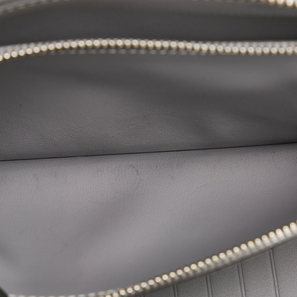 Louis Vuitton Monogram Mirror Vertical Zippy (SHG-HMSpUY)