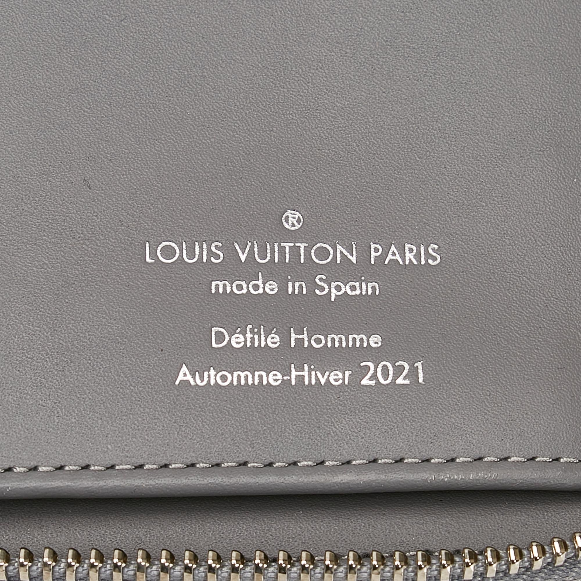 Louis Vuitton Monogram Mirror Vertical Zippy (SHG-HMSpUY)