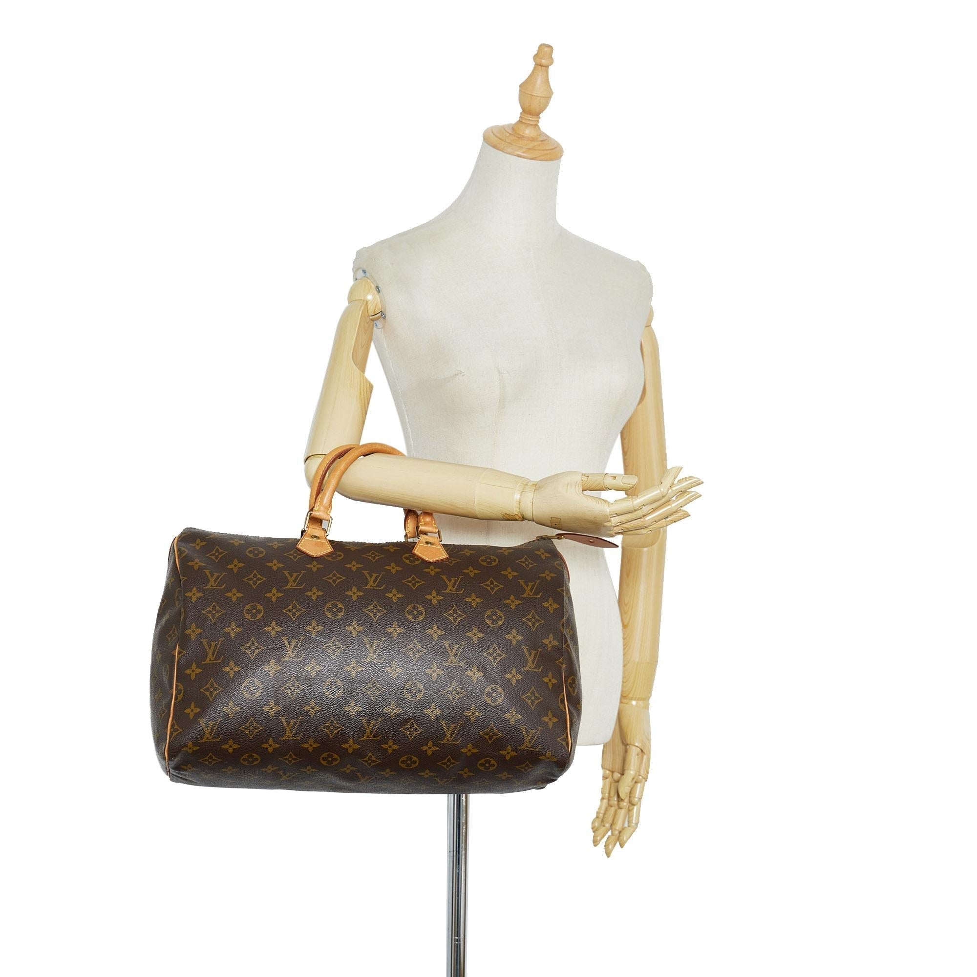 Louis Vuitton Monogram Speedy 40 (SHG-Ow7ULN)