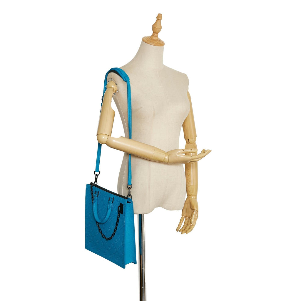 Louis Vuitton Monogram Taurillon Sac Plat (SHG-4v0Lhh)