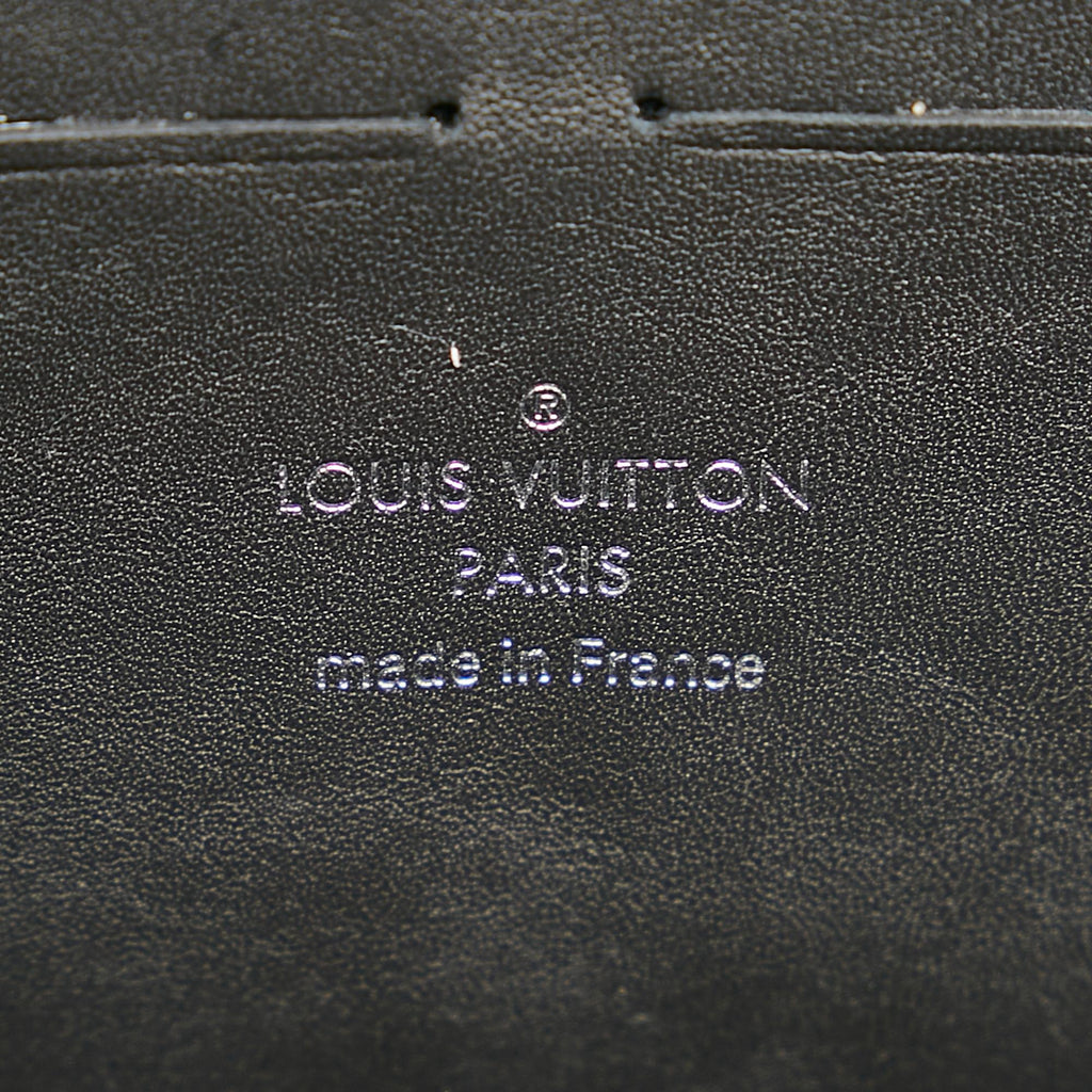 Louis Vuitton Monogram Taurillon Soft Trunk Wallet (SHG-H4CnUJ)