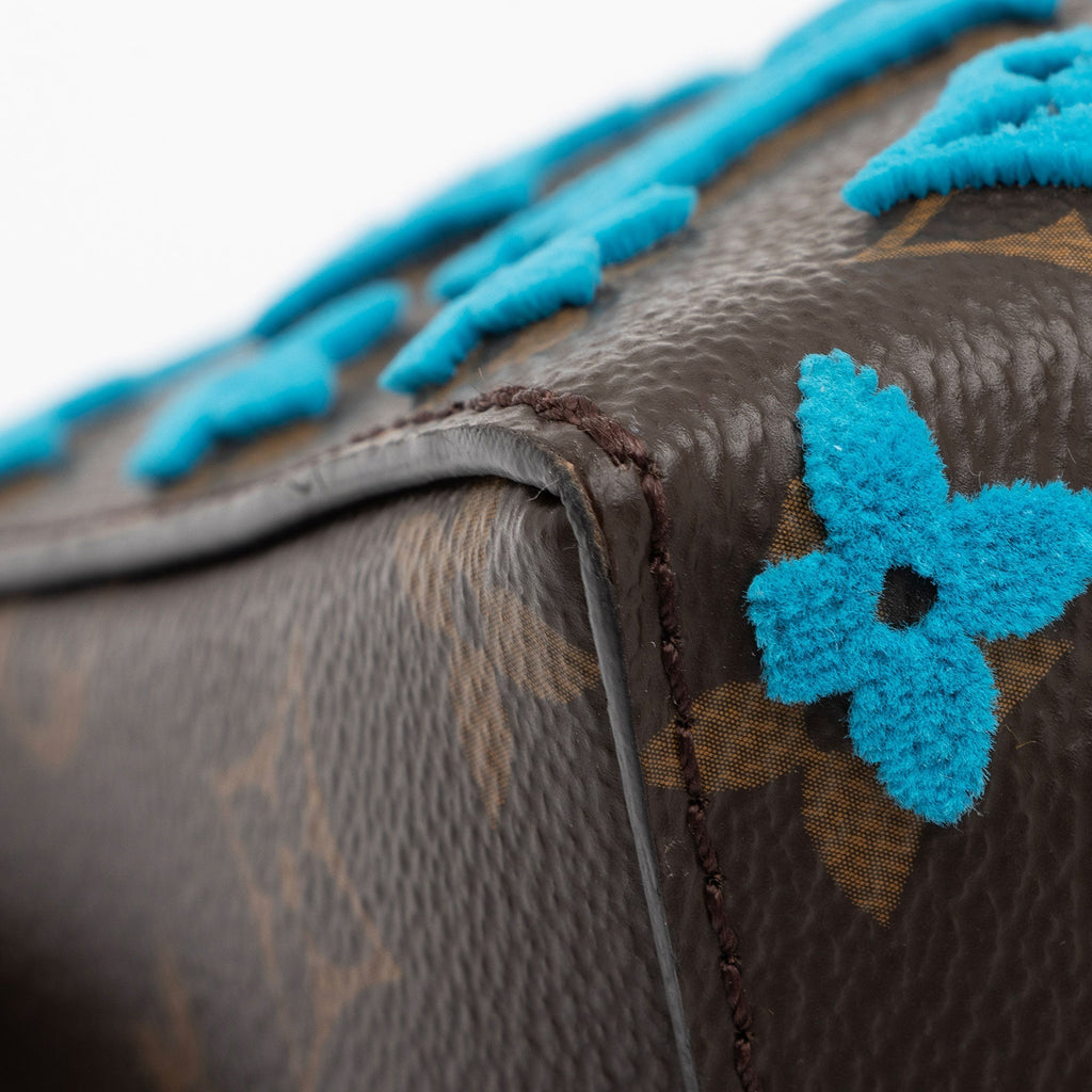 Louis Vuitton Tuffetage Monogram Canvas Triangle Messenger Bag (SHF-xhFdYr)