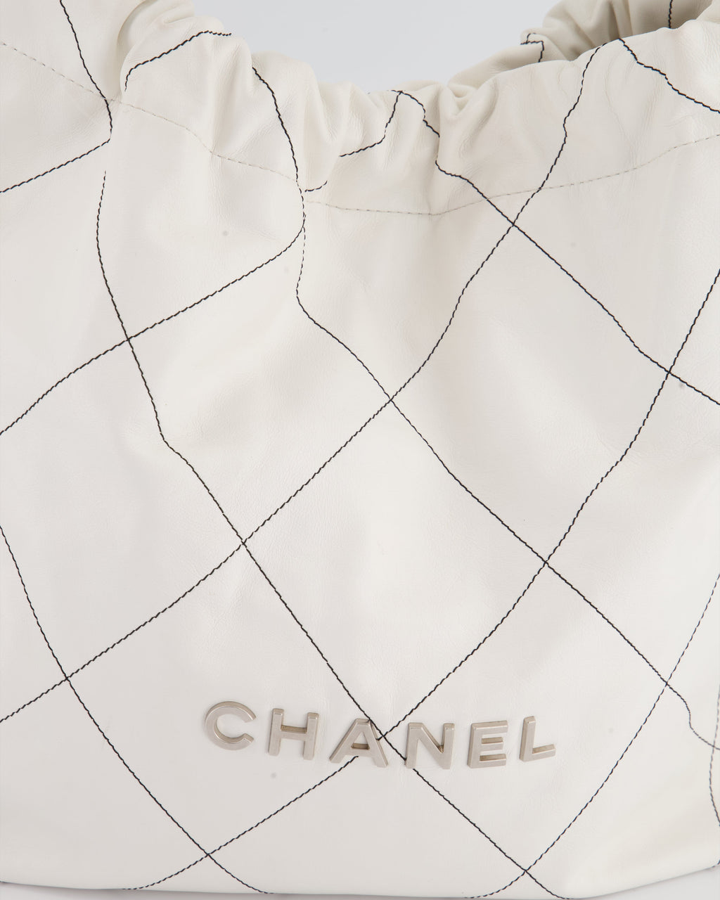 Chanel 22 Bag in White Aged Calfskin with Silver Hardware and Contrast Stitch Detail