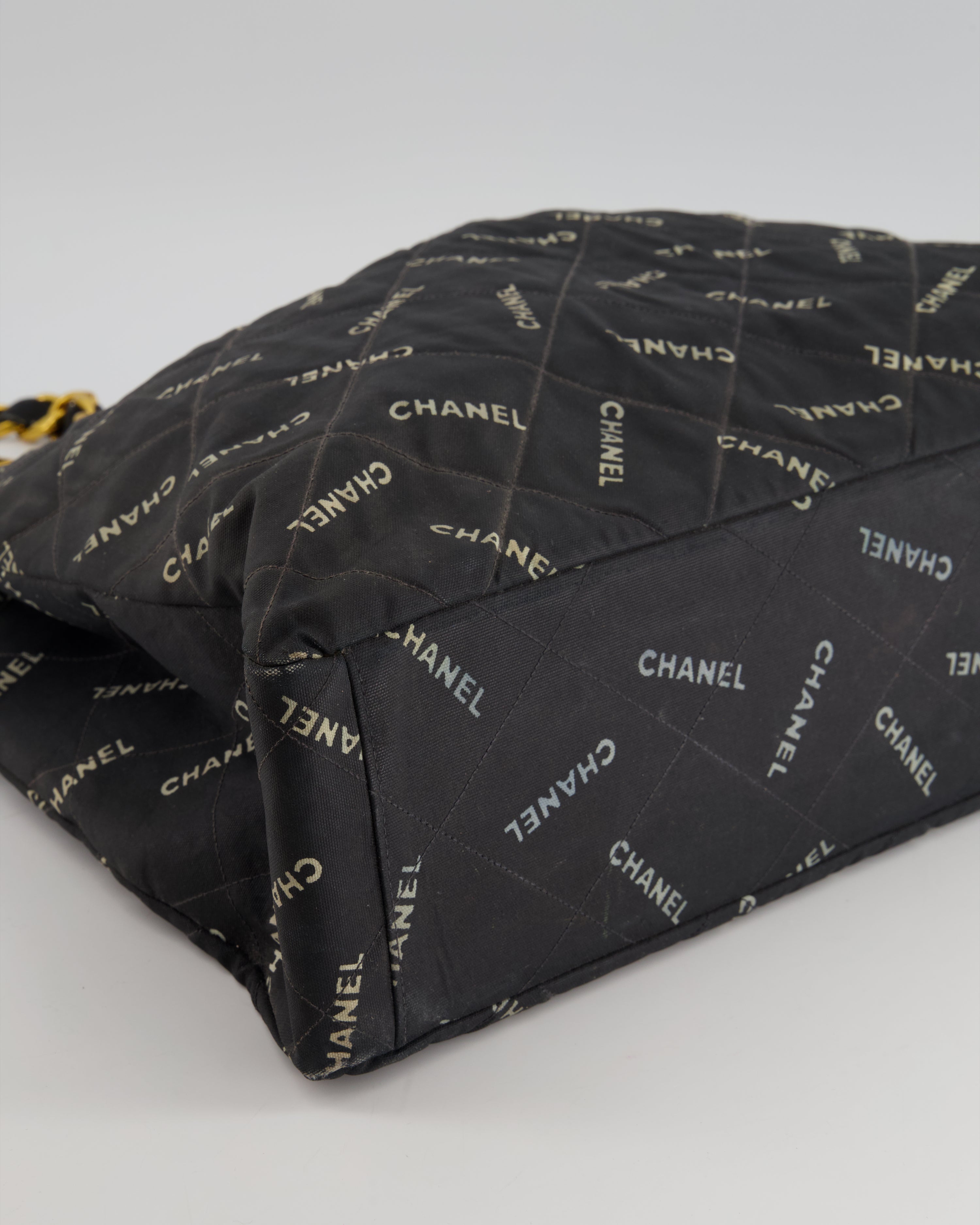 Chanel Vintage Black Bag in Quilted Canvas Logo Print with Gold Hardware