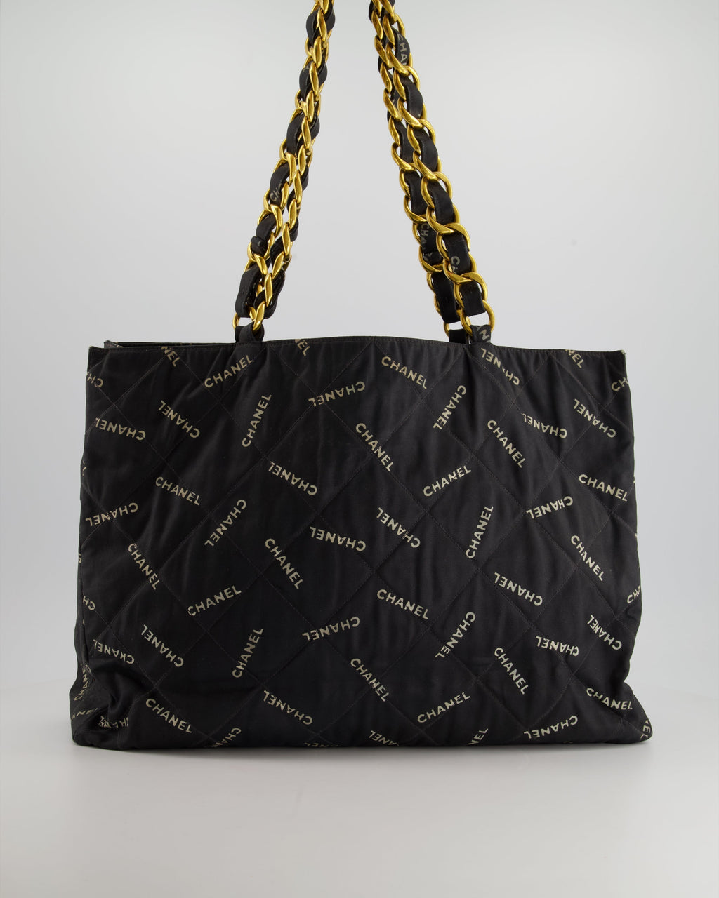 Chanel Vintage Black Bag in Quilted Canvas Logo Print with Gold Hardware