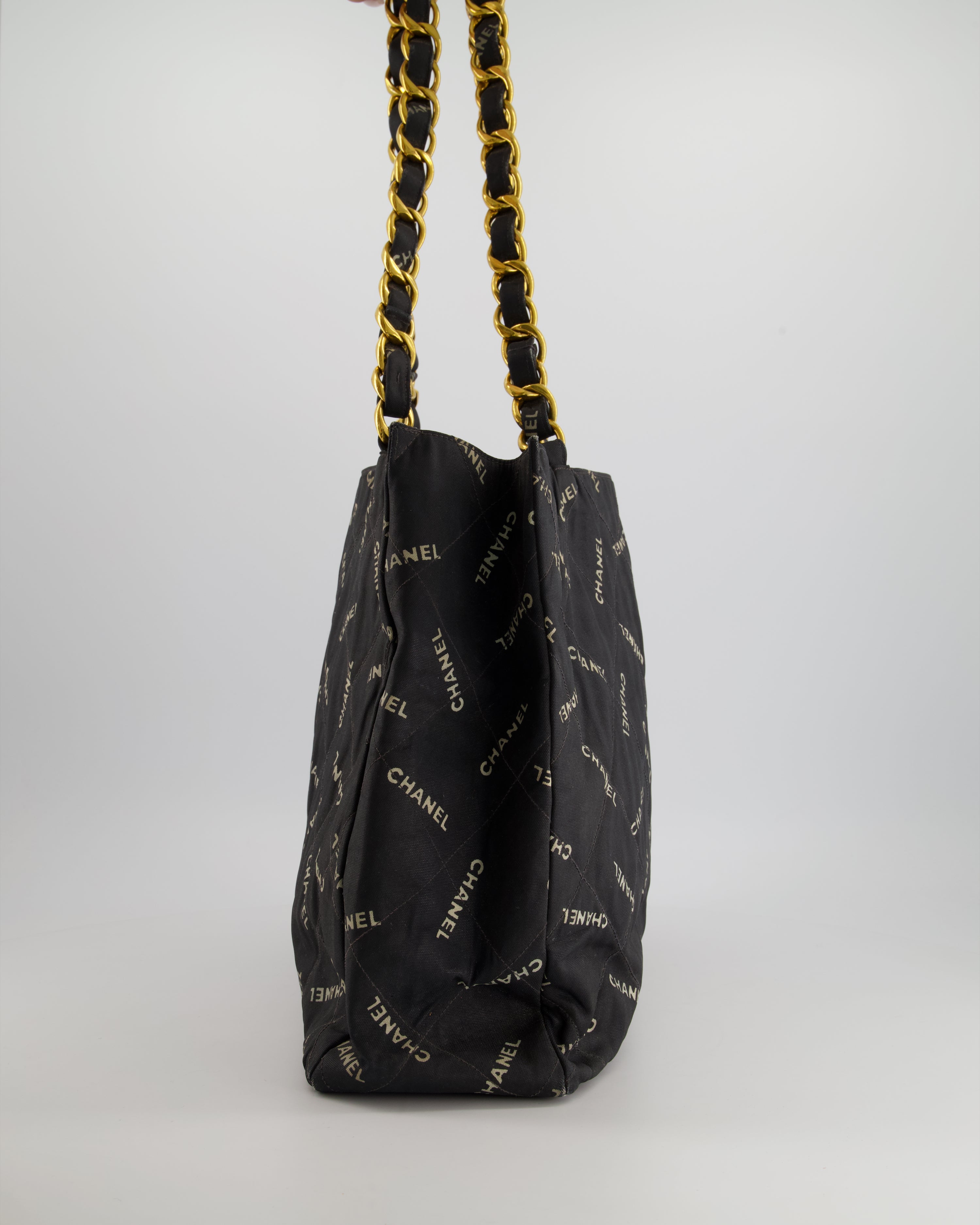 Chanel Vintage Black Bag in Quilted Canvas Logo Print with Gold Hardware