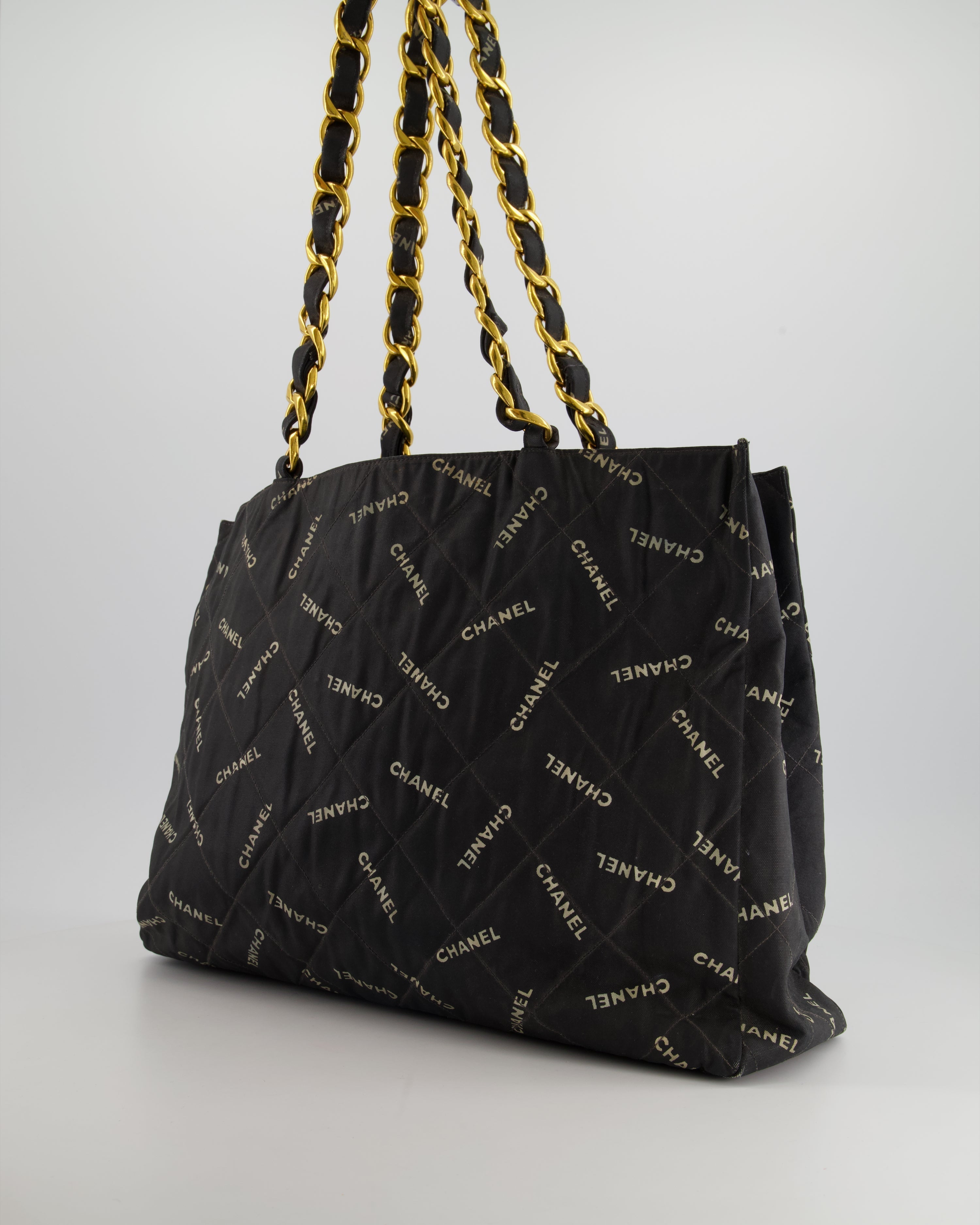 Chanel Vintage Black Bag in Quilted Canvas Logo Print with Gold Hardware