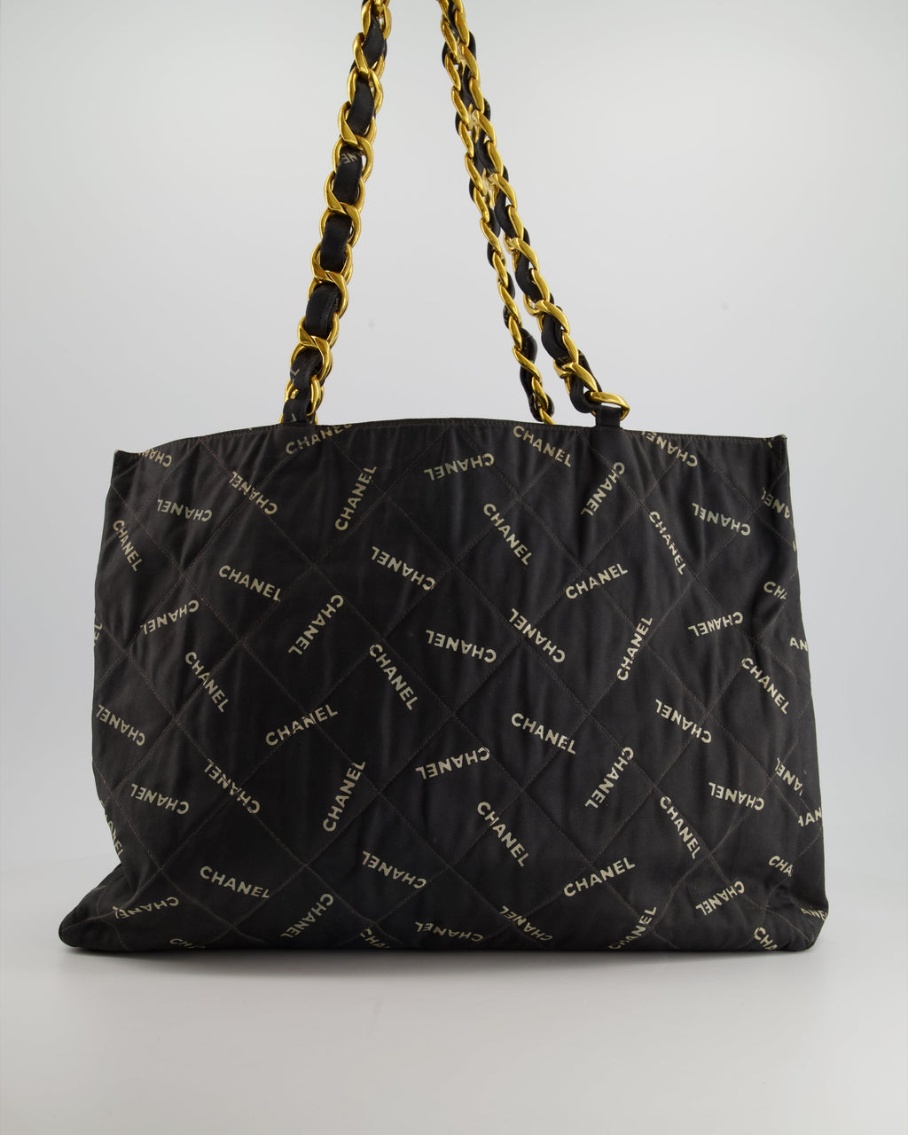 Chanel Vintage Black Bag in Quilted Canvas Logo Print with Gold Hardware