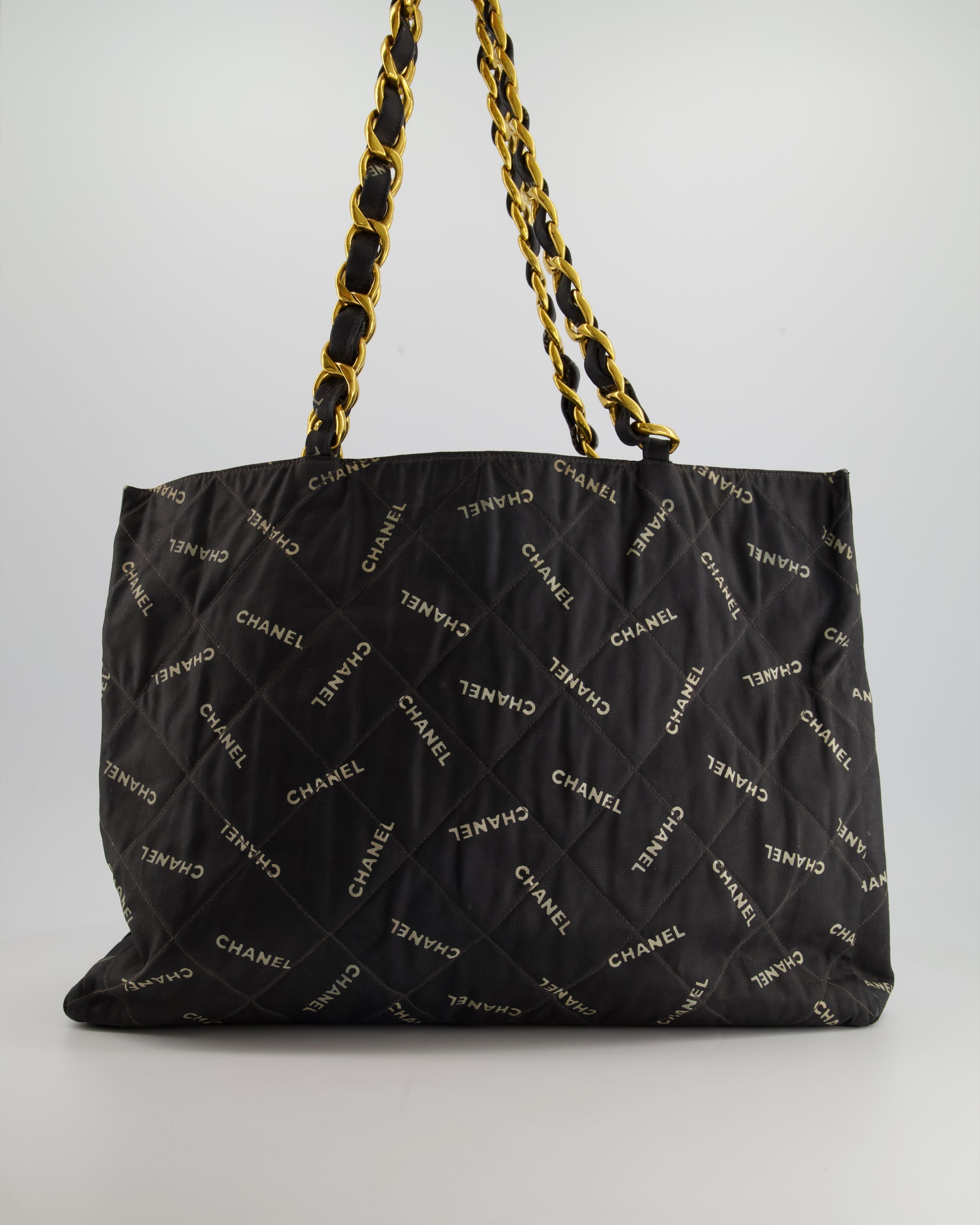 Chanel Vintage Black Bag in Quilted Canvas Logo Print with Gold Hardware