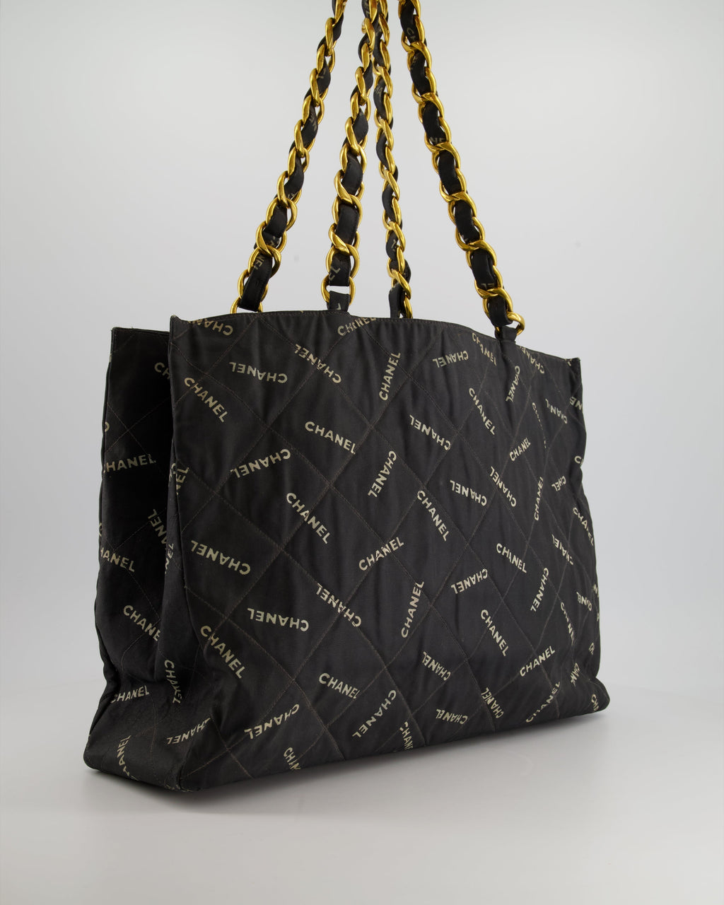 Chanel Vintage Black Bag in Quilted Canvas Logo Print with Gold Hardware