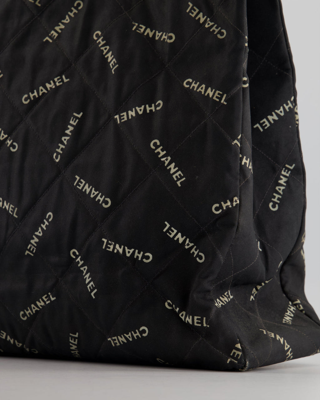 Chanel Vintage Black Bag in Quilted Canvas Logo Print with Gold Hardware