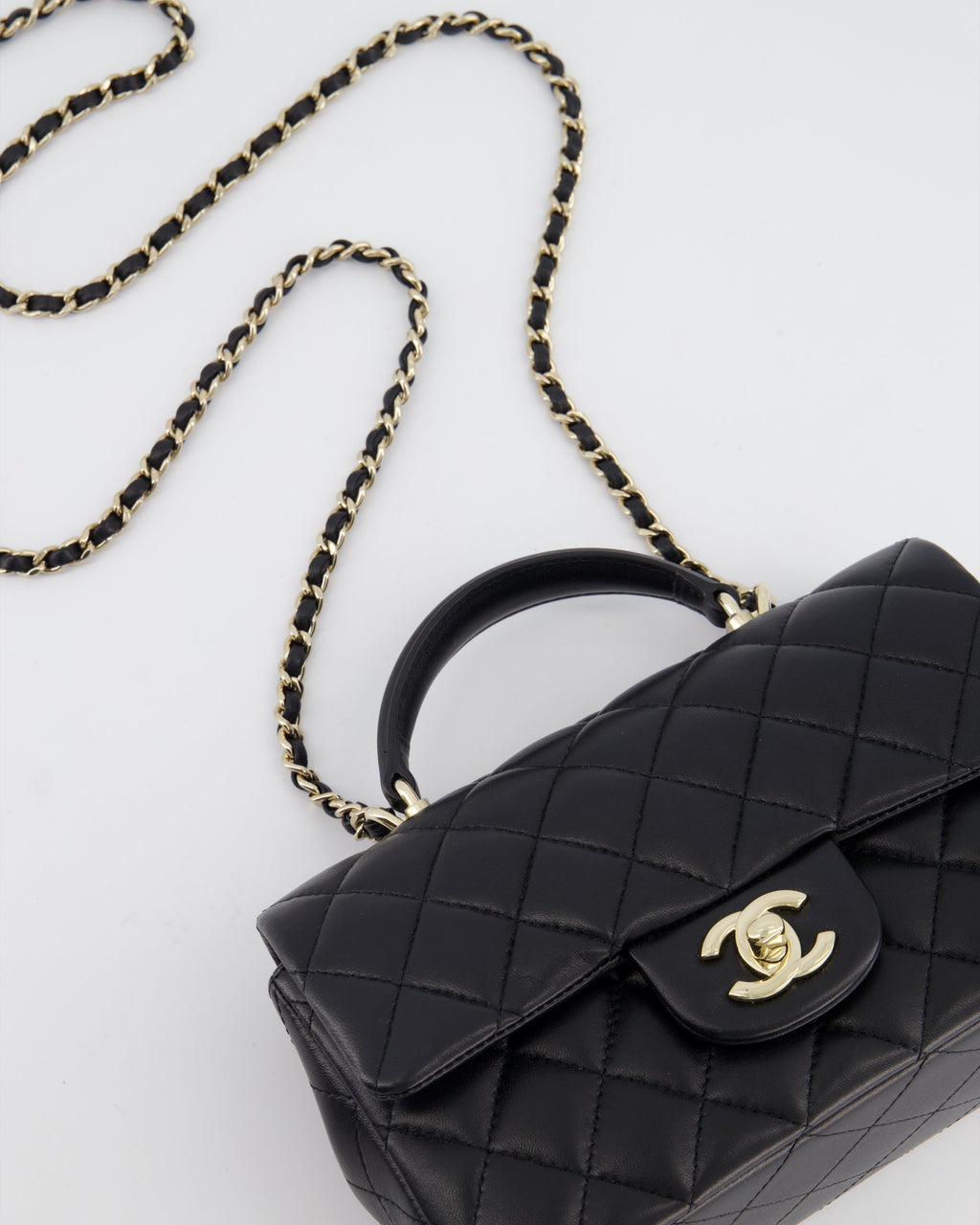Chanel Black Mini Rectangular Top Handle Flap Bag in Lambskin with Champagne Gold Hardware