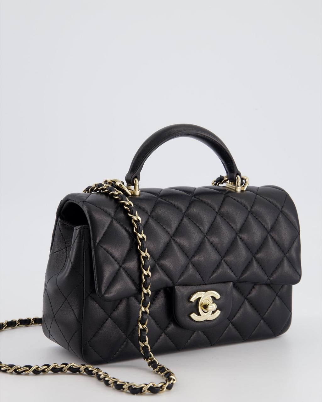 Chanel Black Mini Rectangular Top Handle Flap Bag in Lambskin with Champagne Gold Hardware