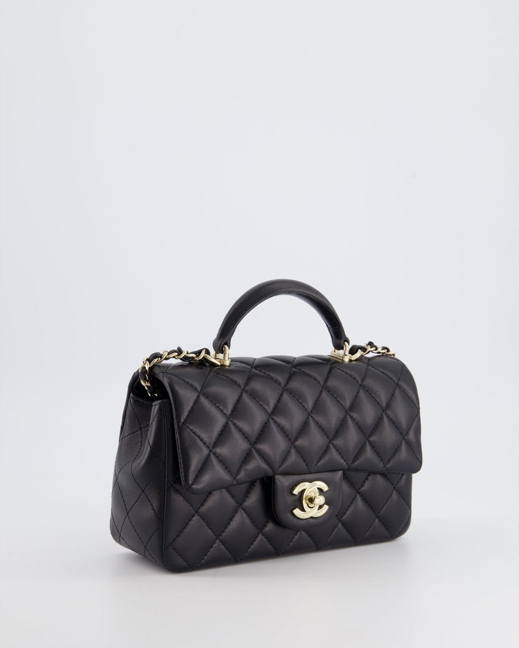 Chanel Black Mini Rectangular Top Handle Flap Bag in Lambskin with Champagne Gold Hardware