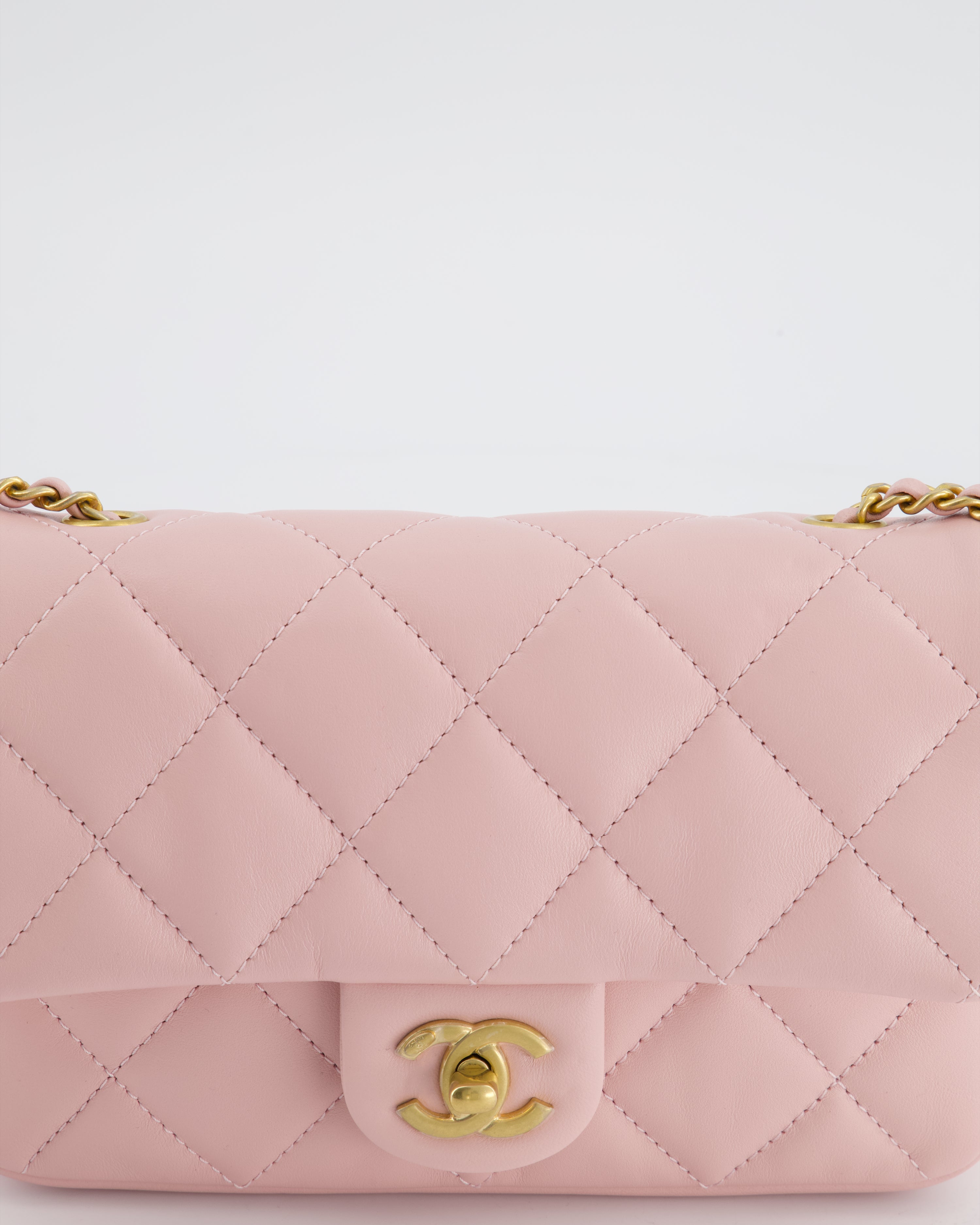Chanel Pink 22B Mini Flap Bag in Lambskin Leather with Gold Hardware and Hearts Chain Detail