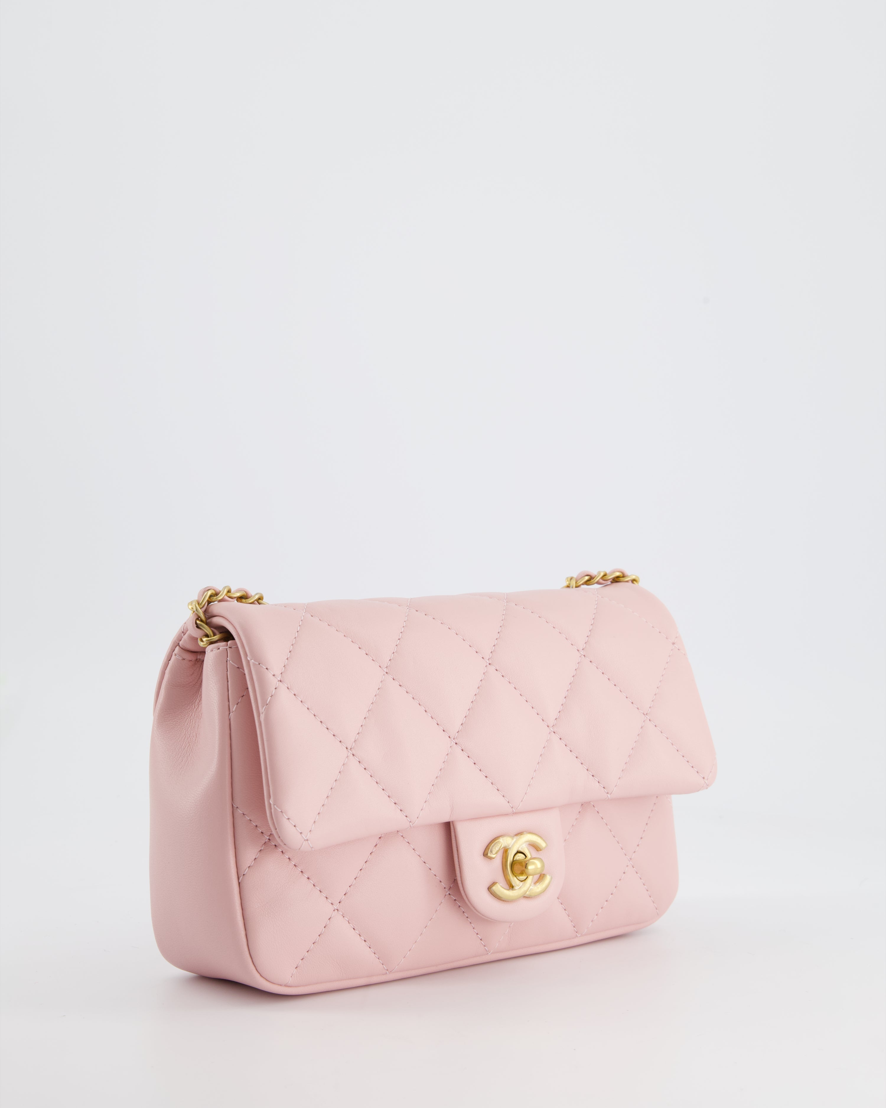 Chanel Pink 22B Mini Flap Bag in Lambskin Leather with Gold Hardware and Hearts Chain Detail