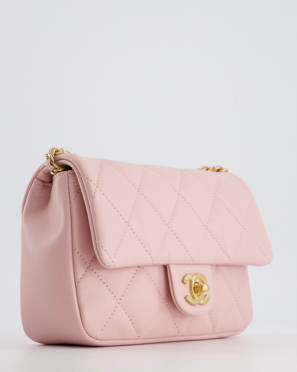 Chanel Pink 22B Mini Flap Bag in Lambskin Leather with Gold Hardware and Hearts Chain Detail