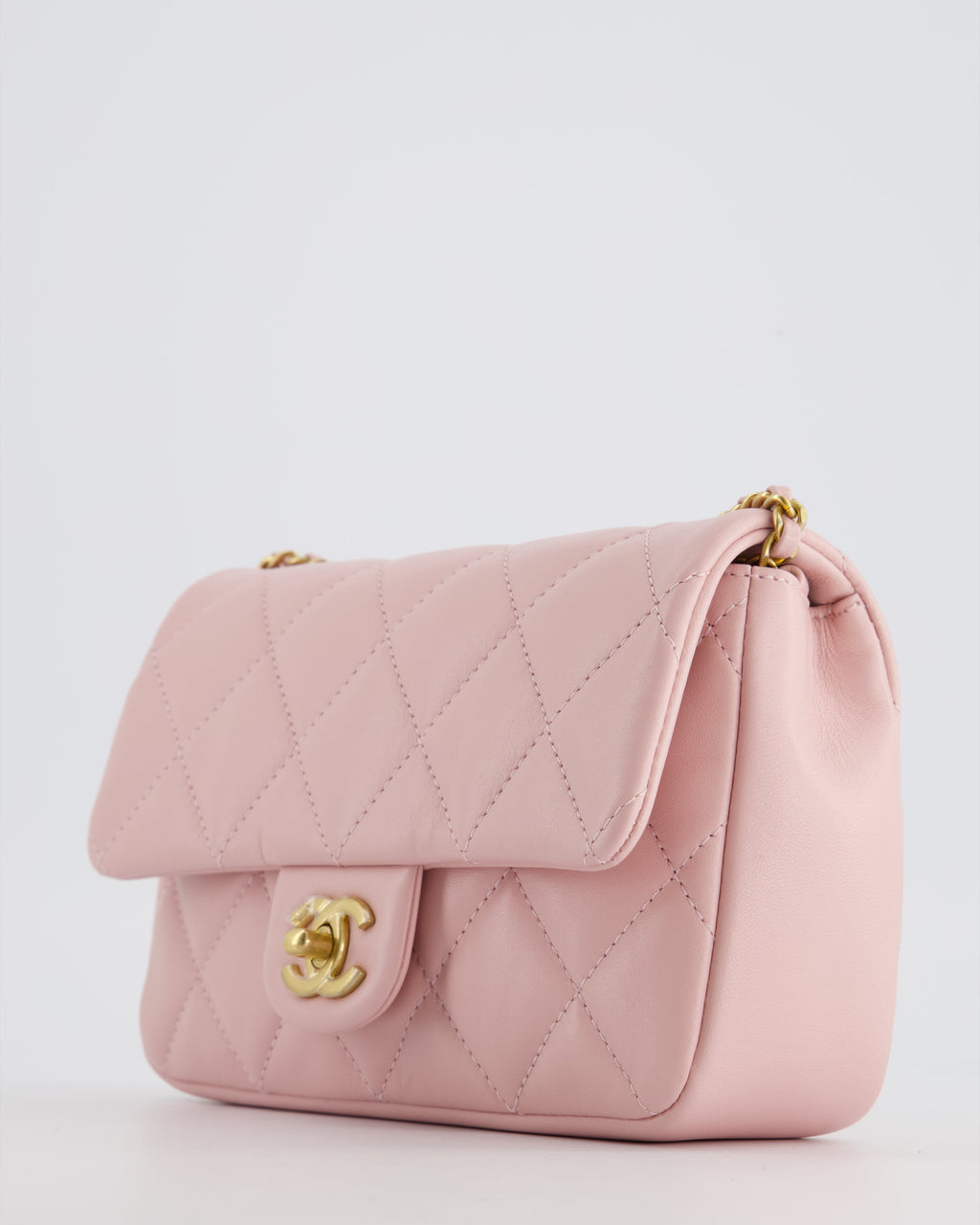 Chanel Pink 22B Mini Flap Bag in Lambskin Leather with Gold Hardware and Hearts Chain Detail
