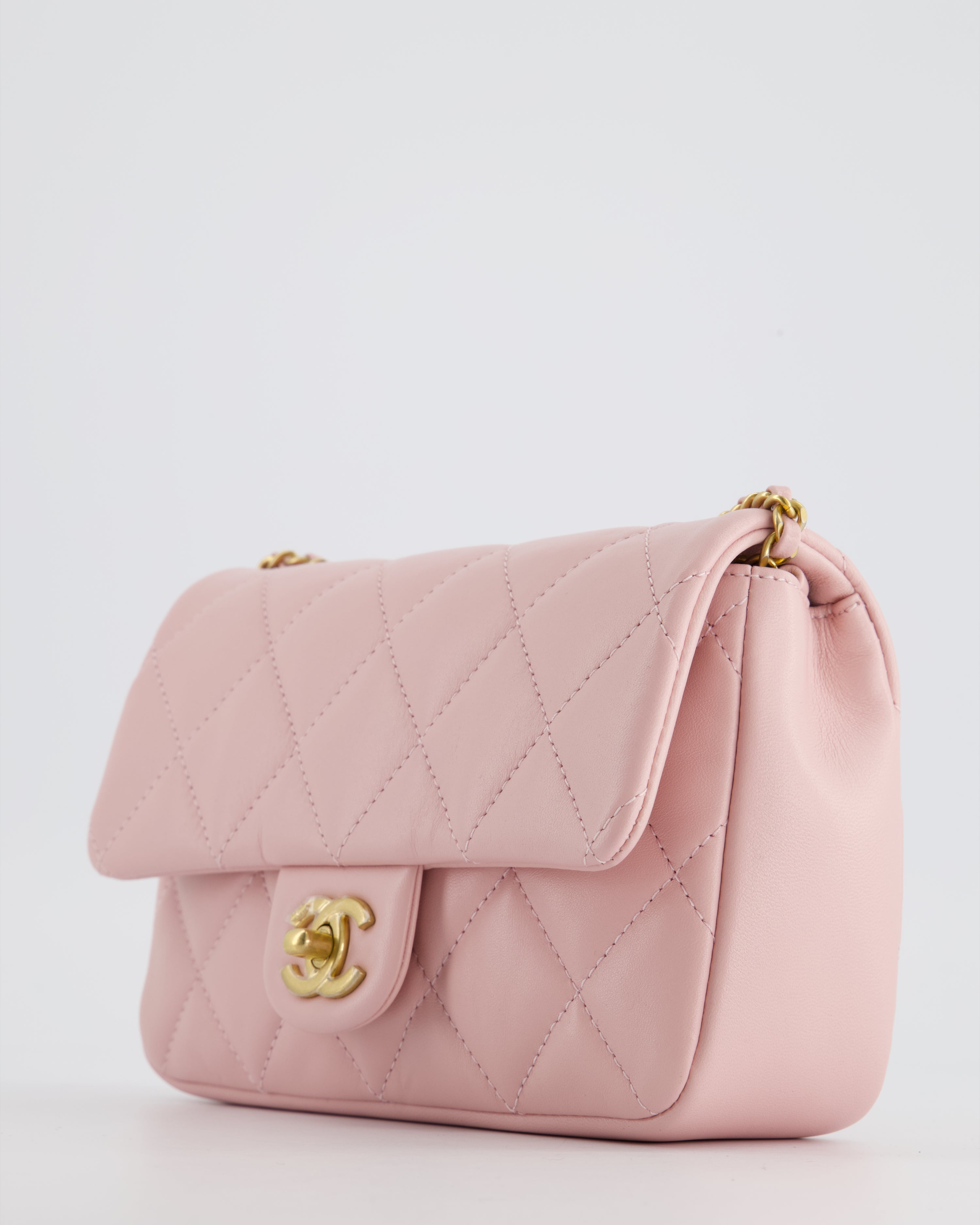Chanel Pink 22B Mini Flap Bag in Lambskin Leather with Gold Hardware and Hearts Chain Detail