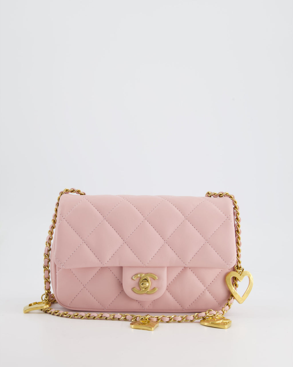 Chanel Pink 22B Mini Flap Bag in Lambskin Leather with Gold Hardware and Hearts Chain Detail