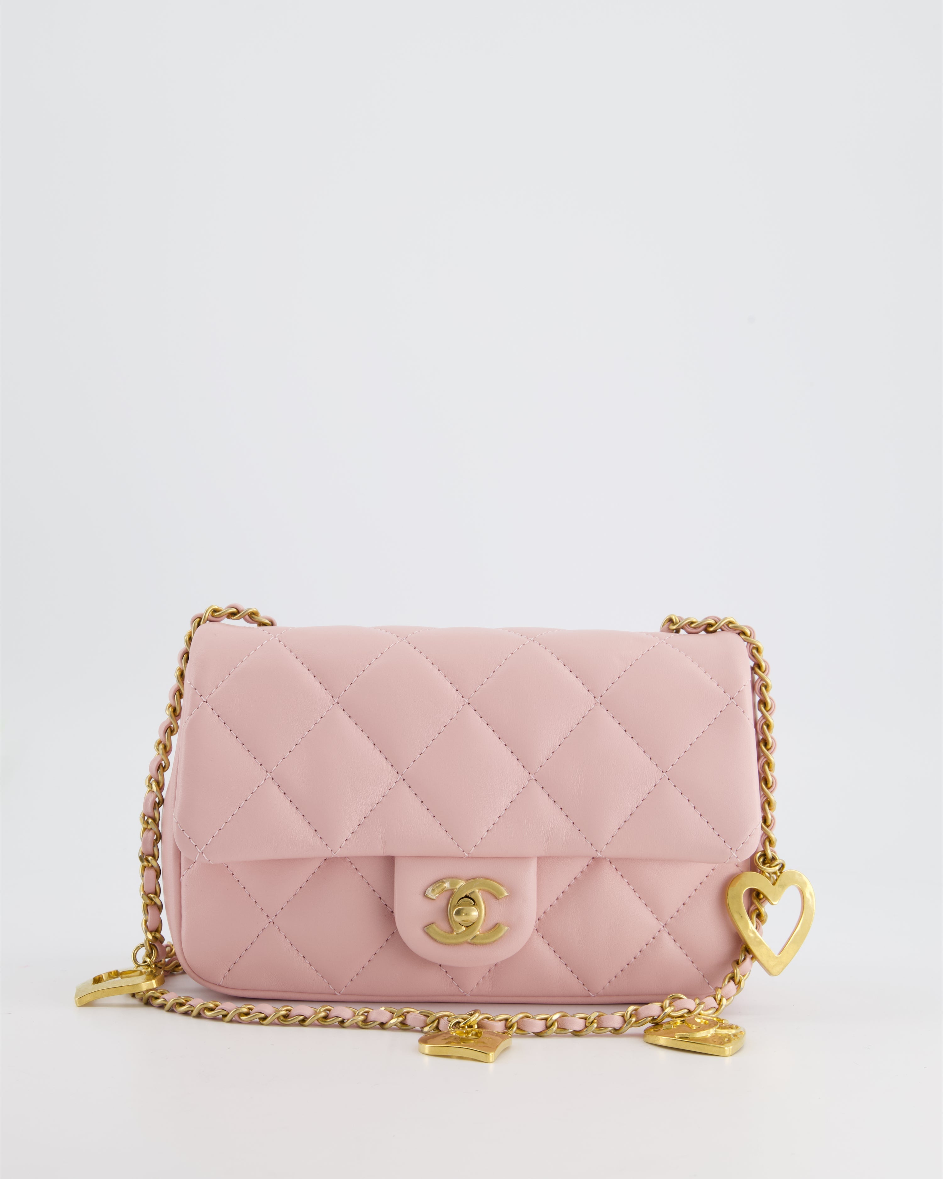 Chanel Pink 22B Mini Flap Bag in Lambskin Leather with Gold Hardware and Hearts Chain Detail