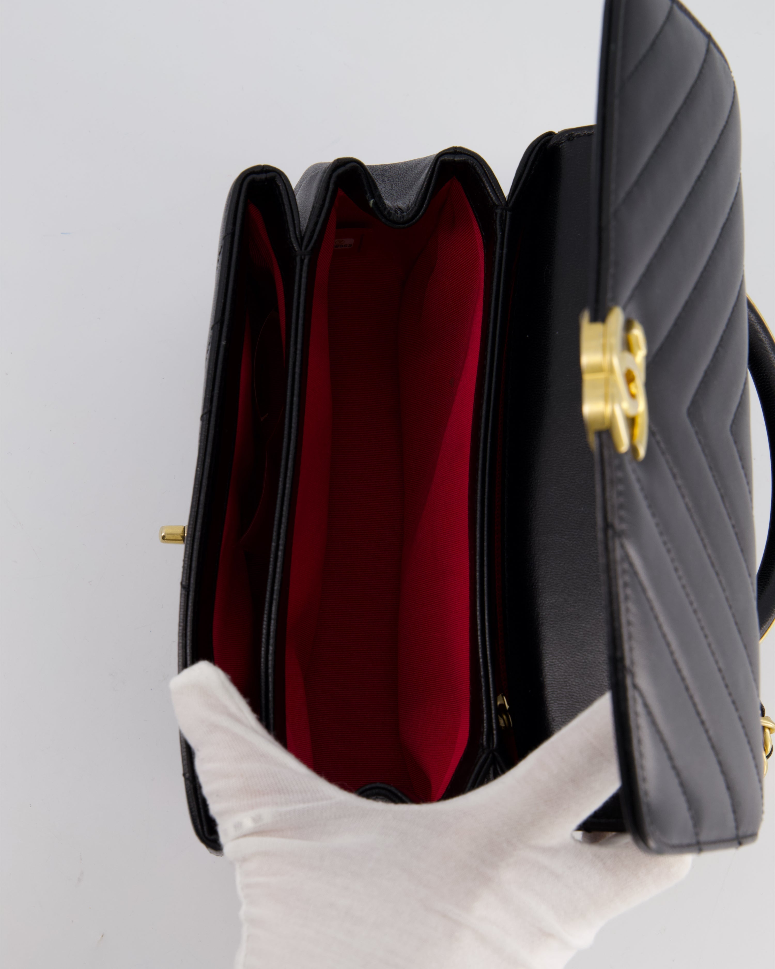 Chanel Black Top Handle Flap Bag in Chevron Lambskin with Antique Gold Hardware