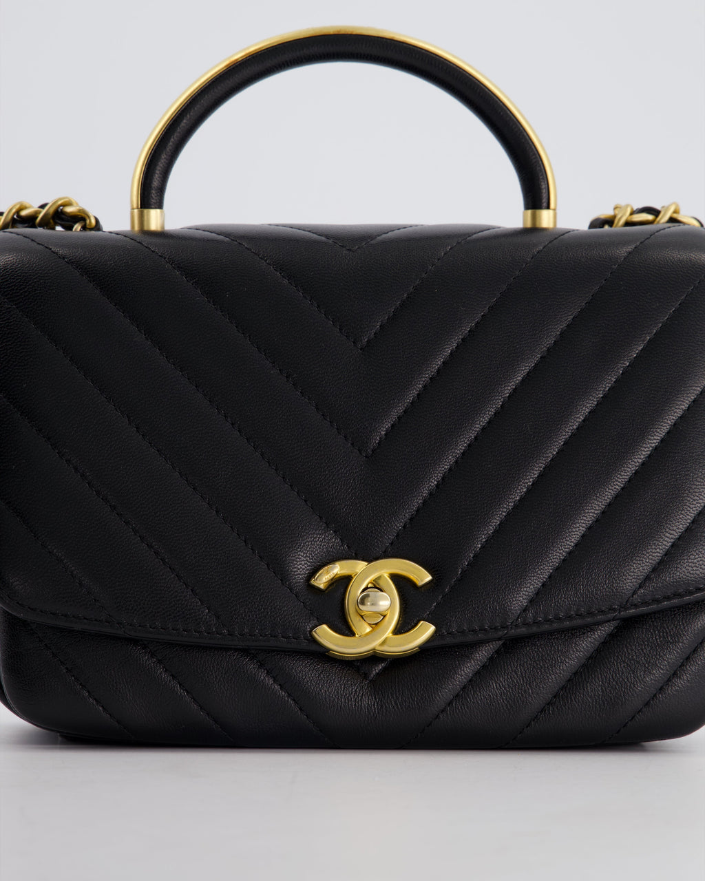 Chanel Black Top Handle Flap Bag in Chevron Lambskin with Antique Gold Hardware
