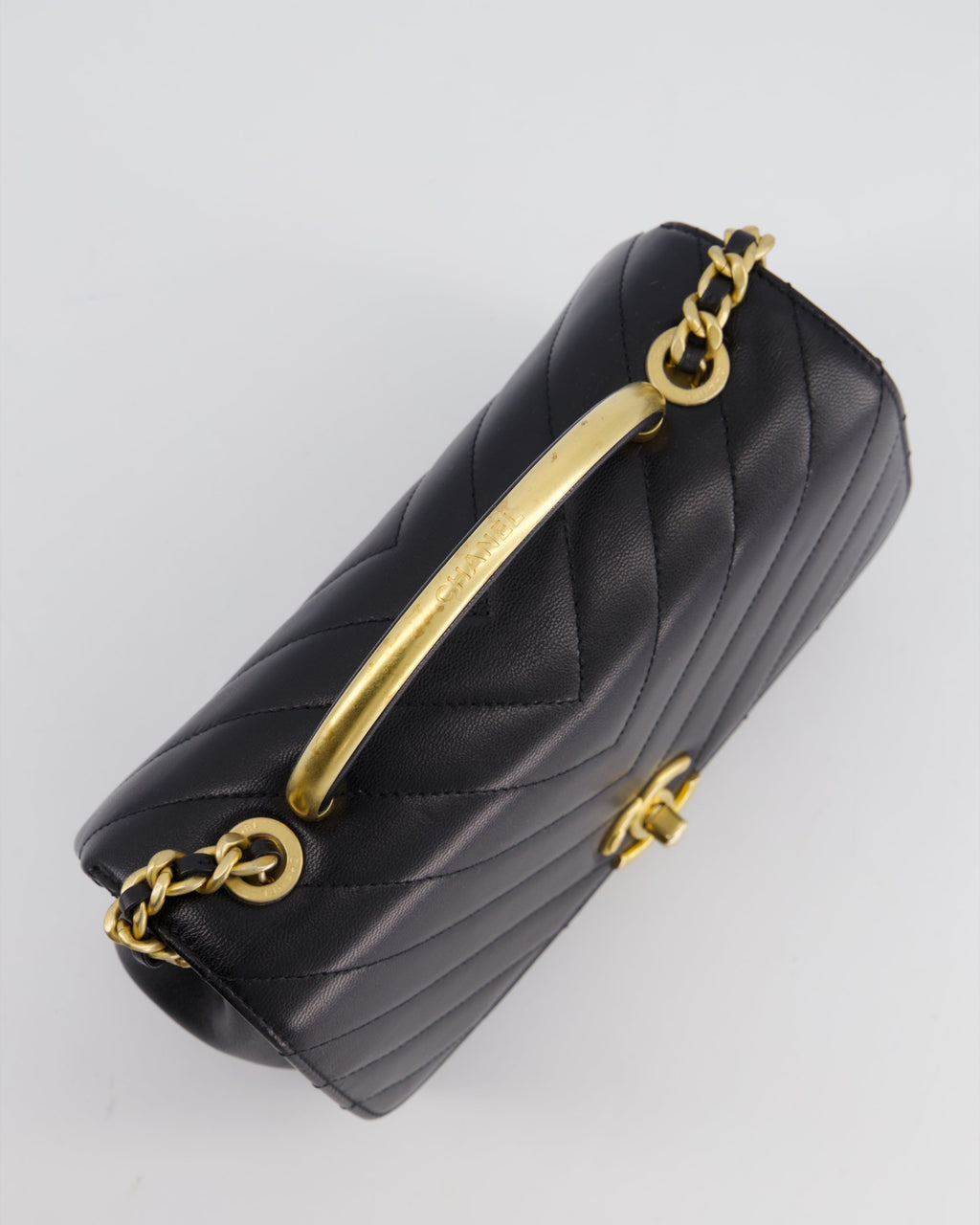 Chanel Black Top Handle Flap Bag in Chevron Lambskin with Antique Gold Hardware