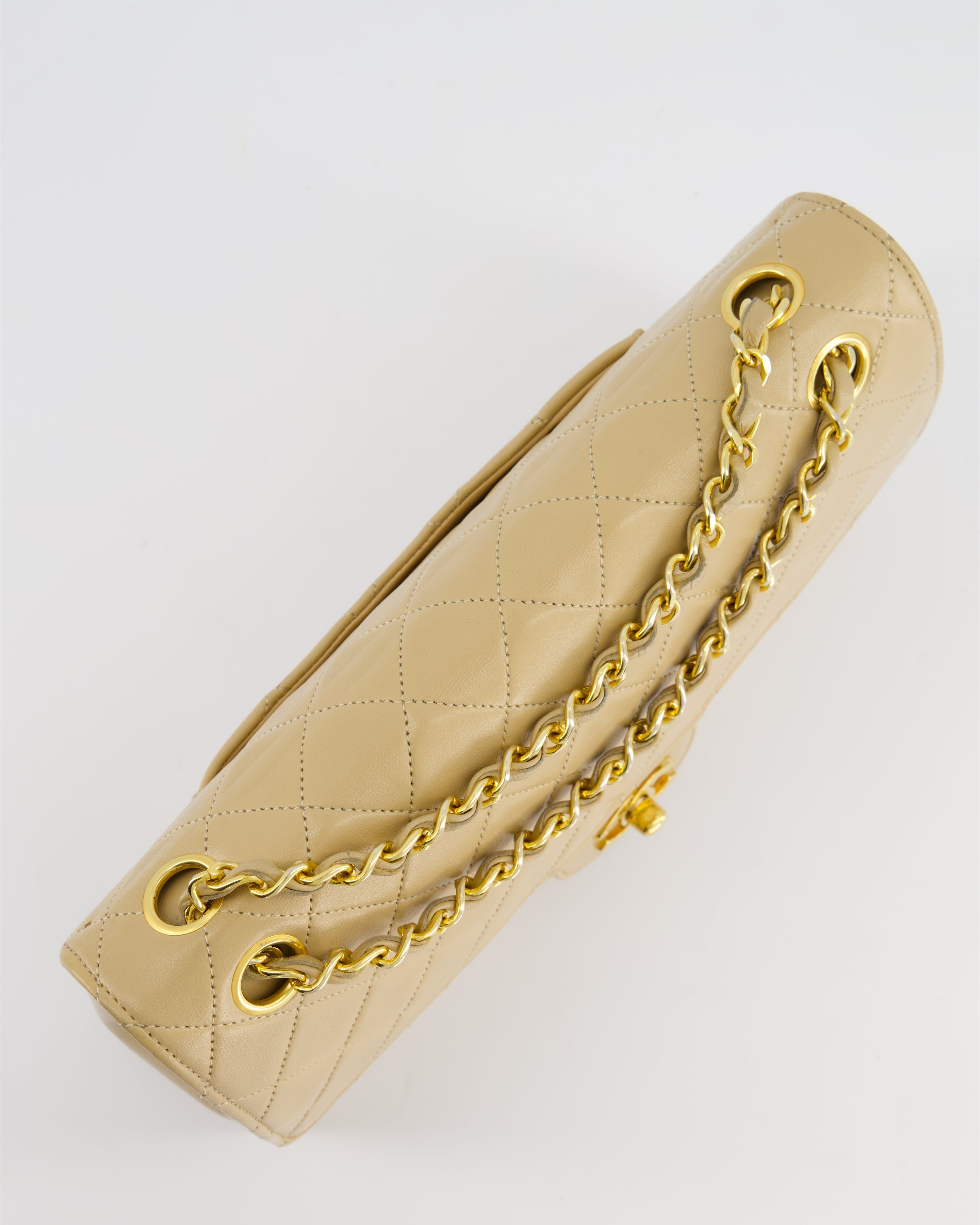 Chanel Beige Vintage Classic Medium Double Flap Bag in Lambskin Leather with 24K Gold Hardware and Stitched Edge