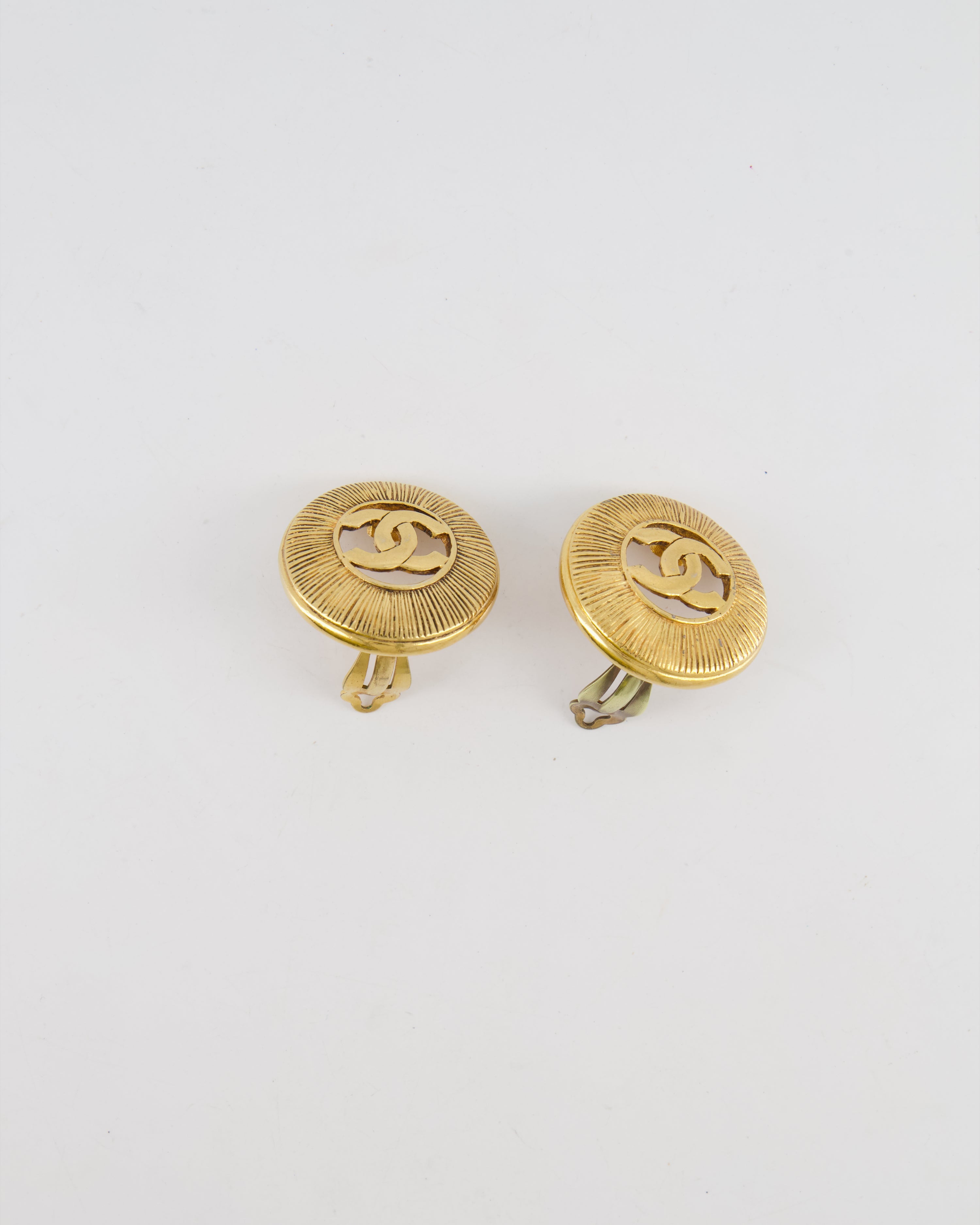 Chanel Vintage Gold Large Round Button Clip On Earrings with Striped Detail and CC Logo
