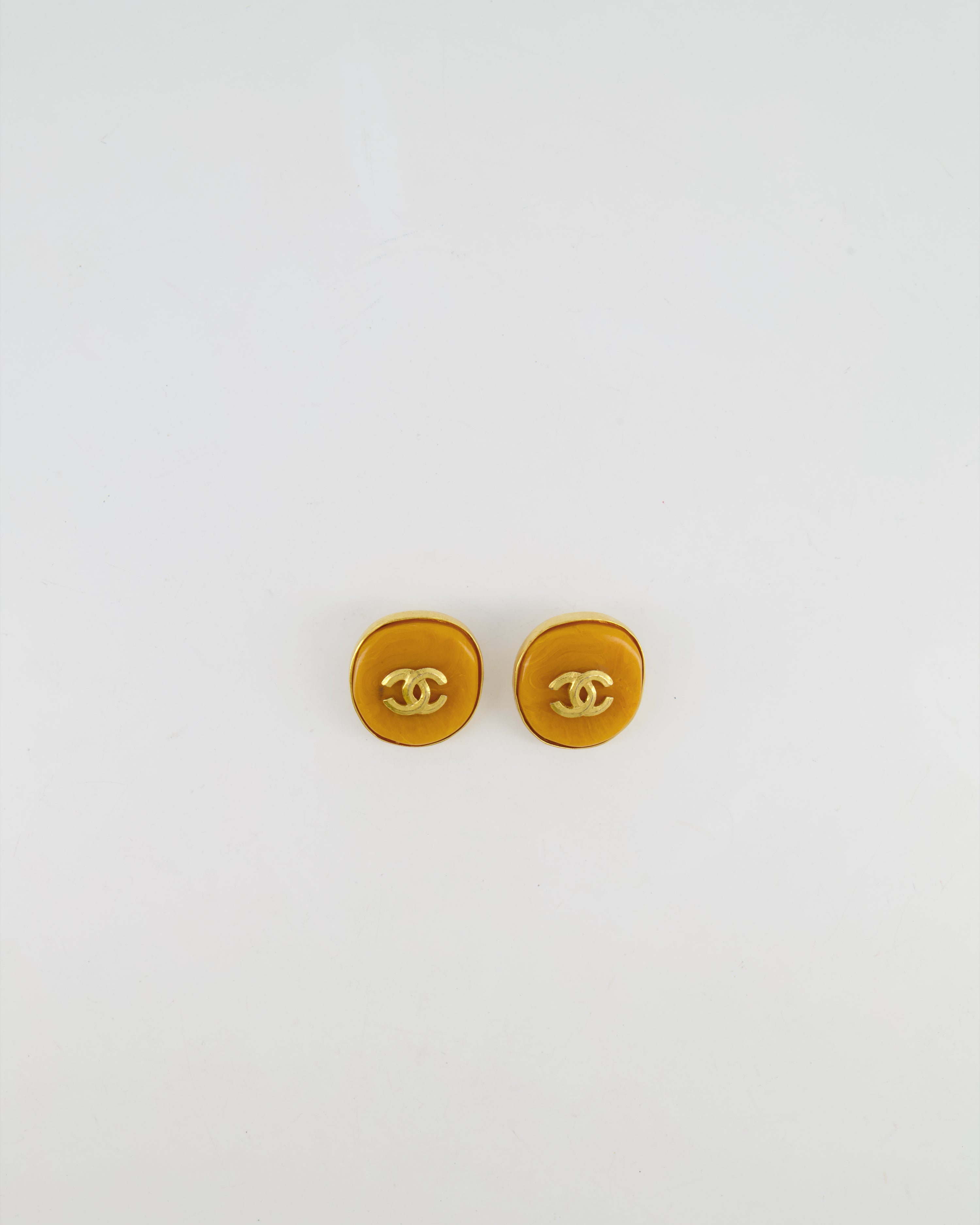 Chanel Vintage 98P Orange Rounded Clip On Earrings with Gold Rim and CC Logo Detail