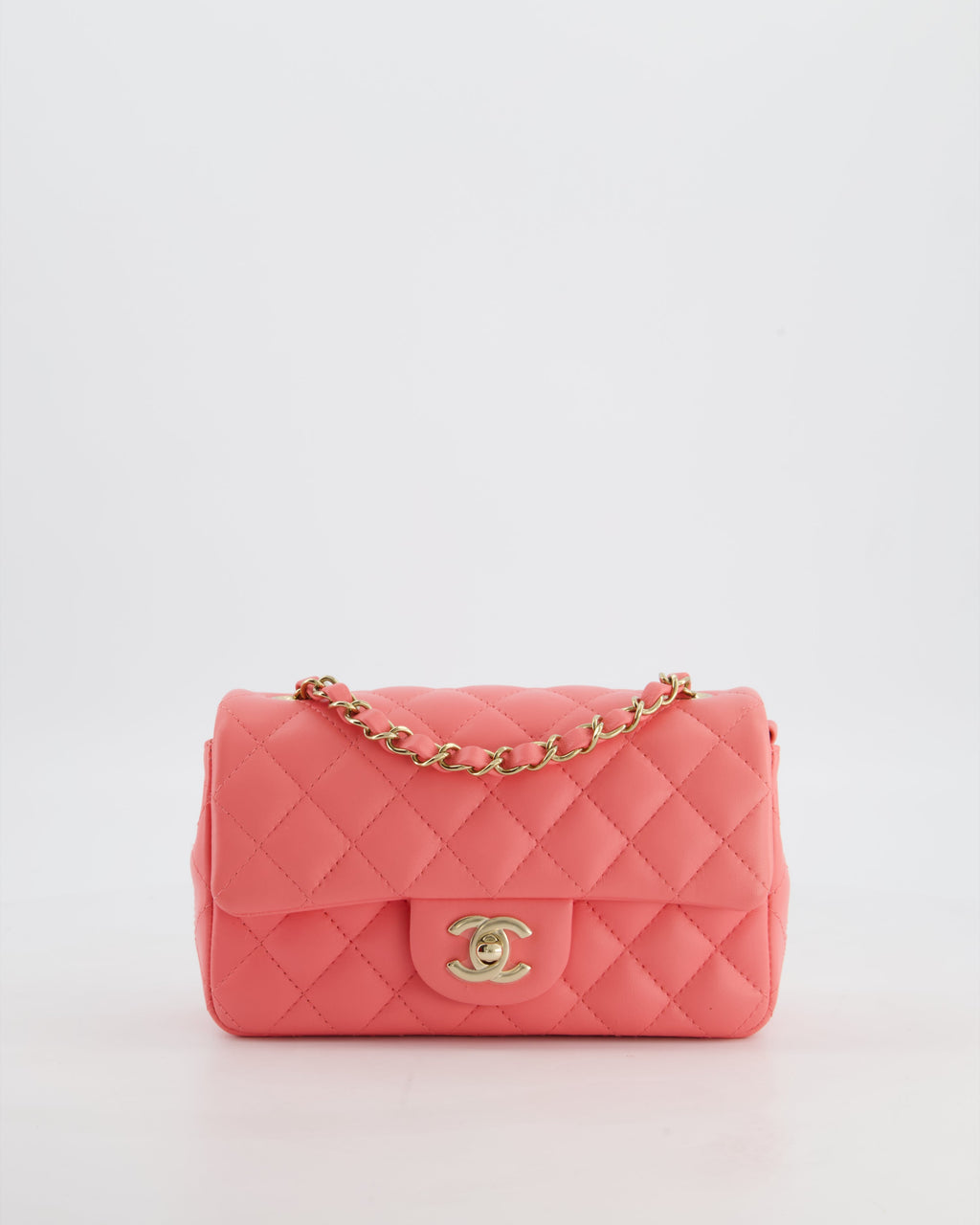 Chanel Classic Mini Rectangular Flap Bag in Hot Pink Lambskin Leather with Champagne Gold Hardware