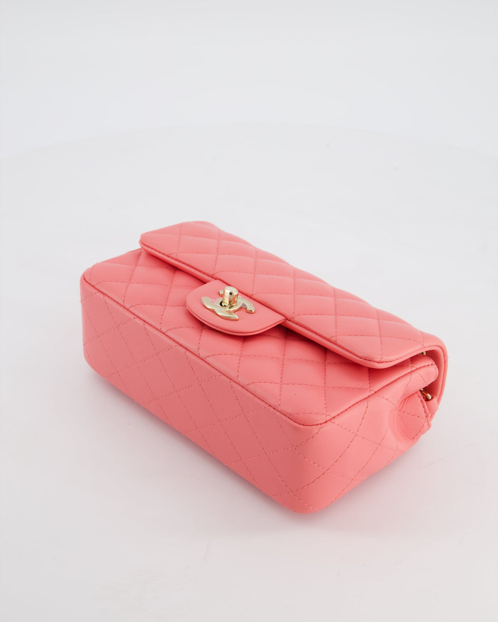 Chanel Classic Mini Rectangular Flap Bag in Hot Pink Lambskin Leather with Champagne Gold Hardware