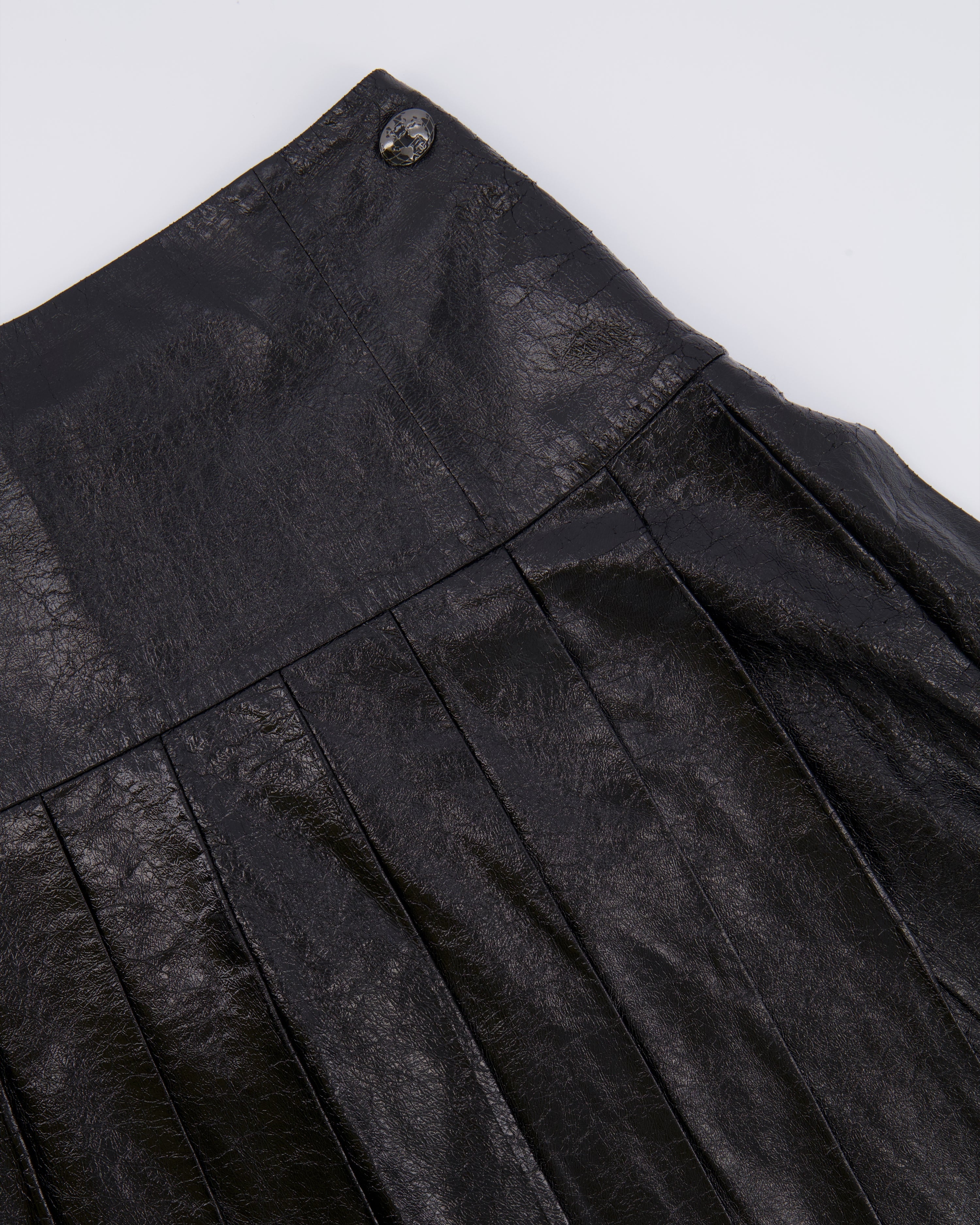 Chanel Fall 2013 Black Distressed Lambskin Leather Pleated Mini Skirt with Silver and Black Globe CC Logo Button Detail Size FR 34 (UK 6)