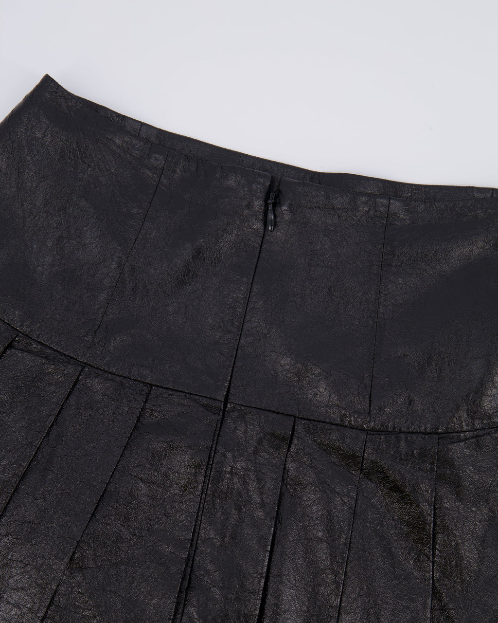 Chanel Fall 2013 Black Distressed Lambskin Leather Pleated Mini Skirt with Silver and Black Globe CC Logo Button Detail Size FR 34 (UK 6)