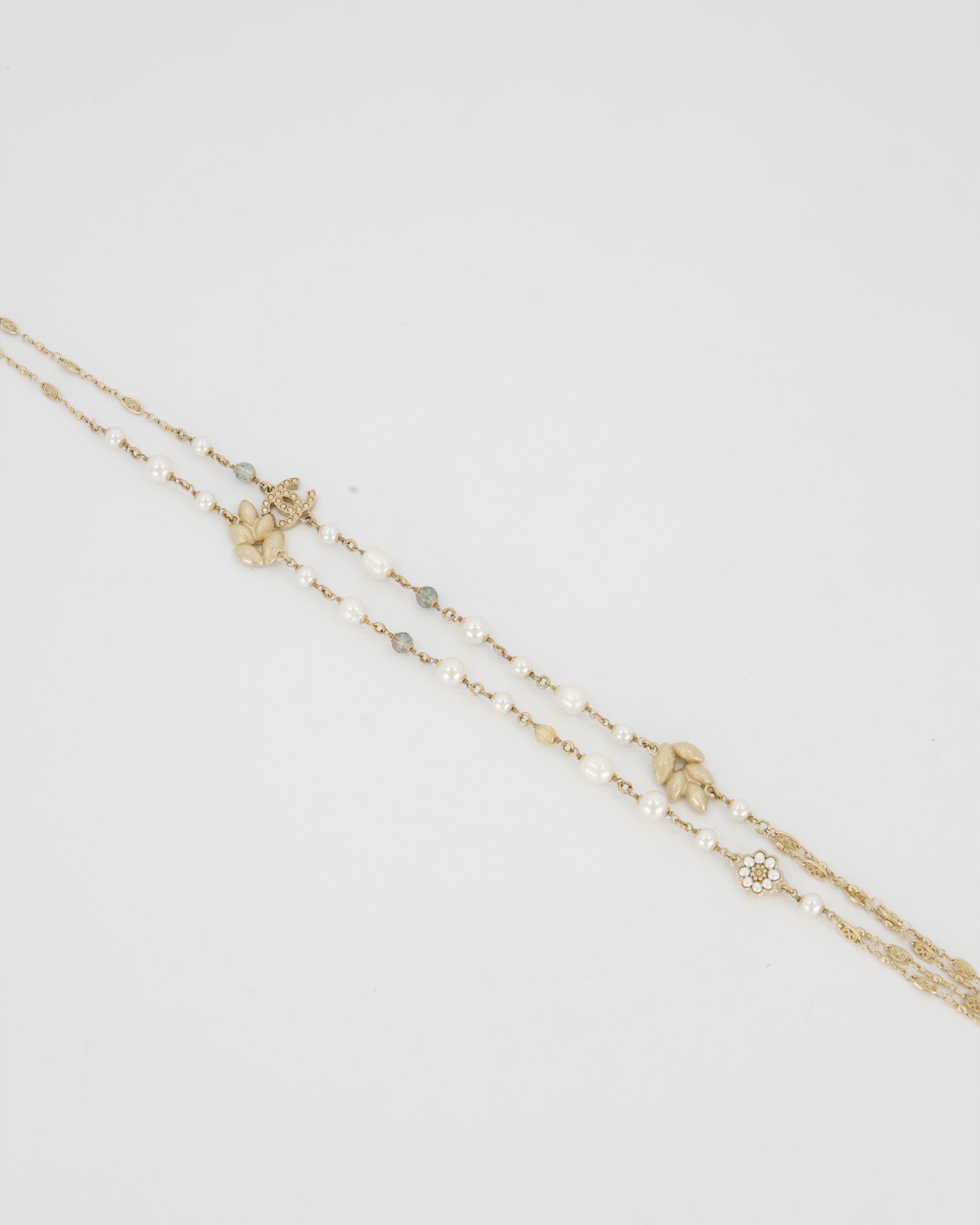 Chanel Gold Long Choker and Necklace with Leaf, Daisy, and Pearl Embellishments and Crystal CC Logo Detail